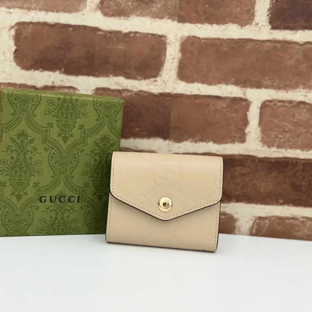 Gucci Embossed Monogram Wallet image 1