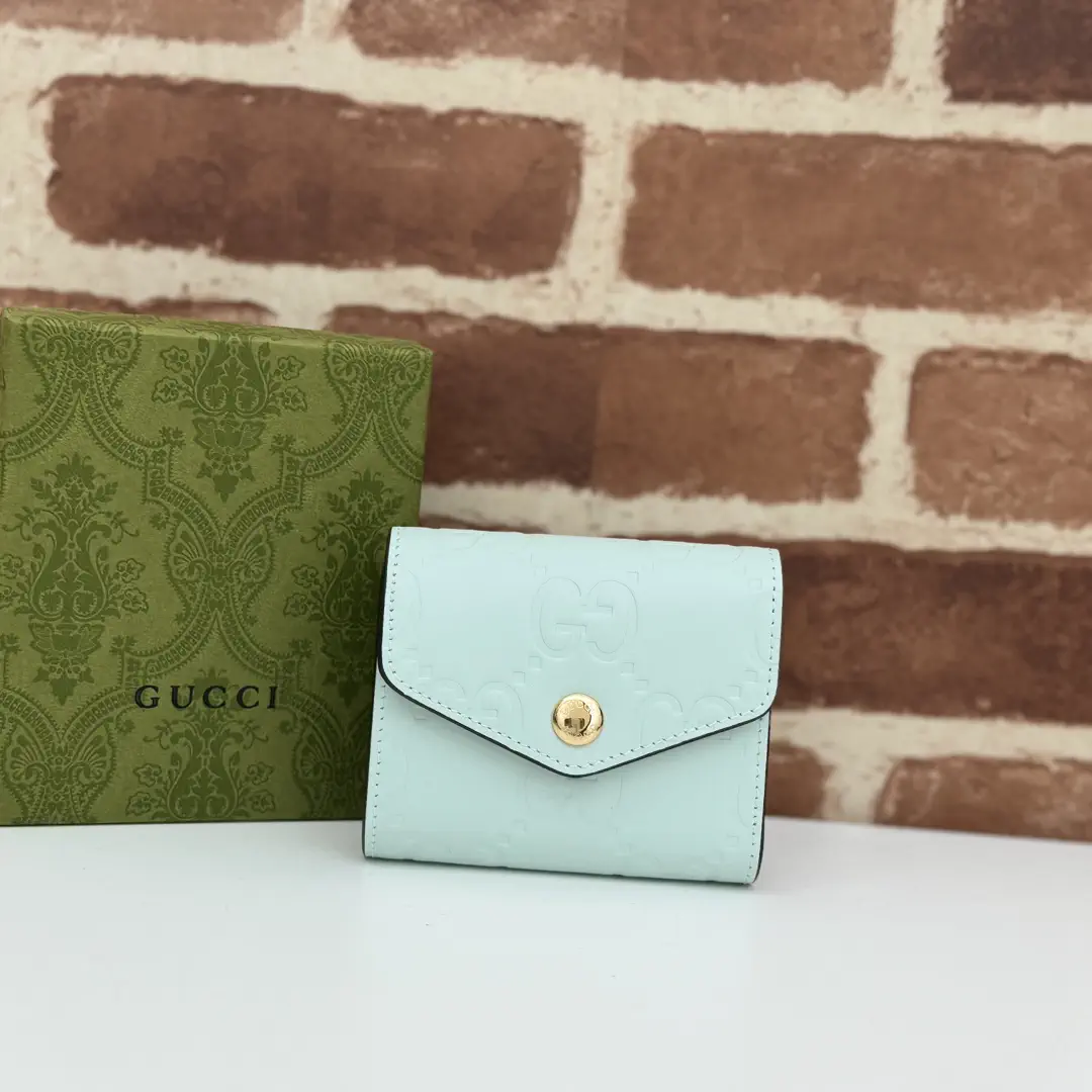 Gucci Embossed Monogram Compact Wallet image 1