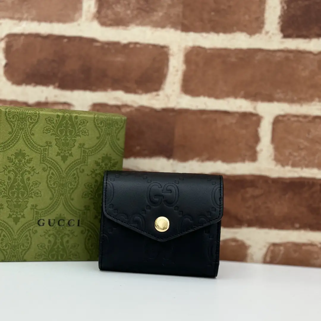 Gucci Embossed Monogram Compact Wallet image 1
