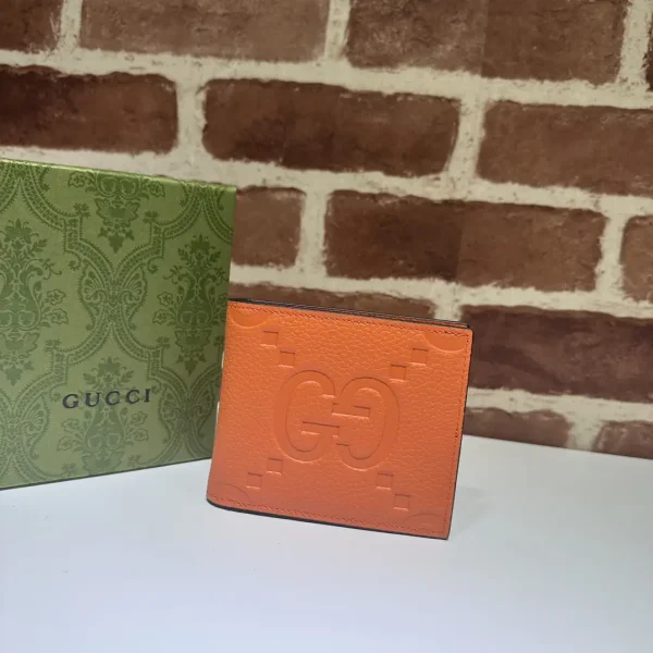 Gucci Orange Embossed GG Bifold Wallet image 1