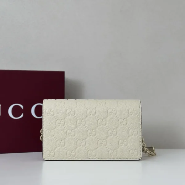Gucci Monogram Embossed Chain Wallet image 1