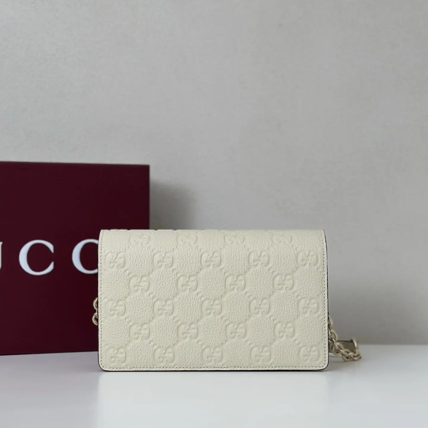 Gucci Monogram Embossed Chain Wallet image 1