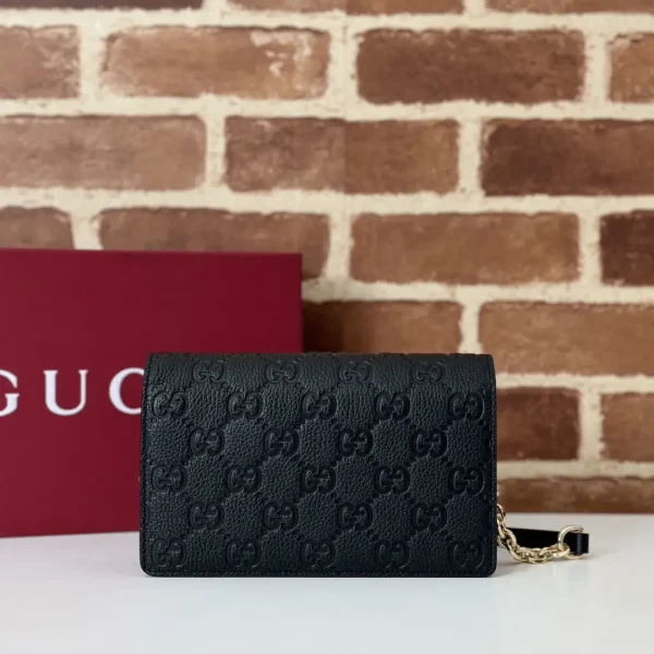 Gucci Embossed GG Wallet on Chain image 1
