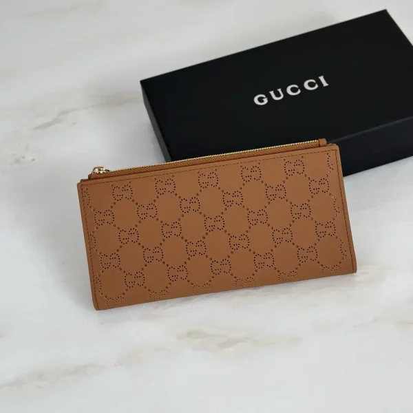 Gucci Perforated Monogram Zip Wallet image 1