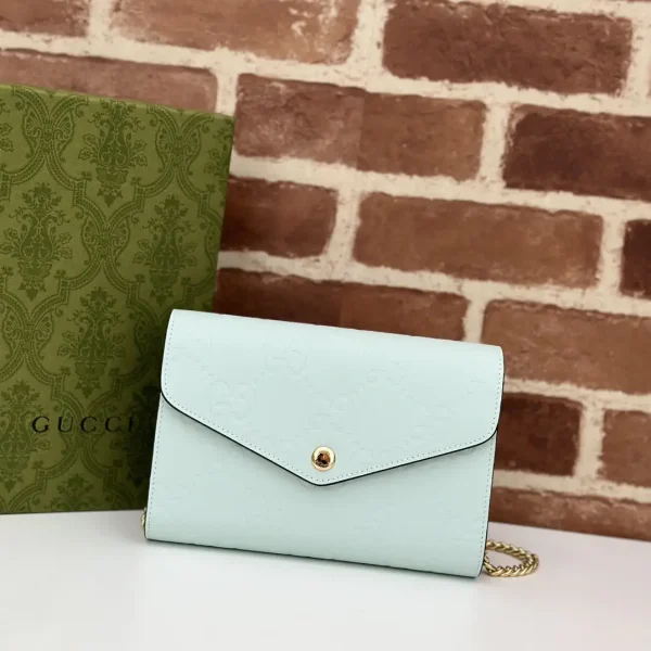 Gucci Embossed GG Chain Crossbody Bag image 1