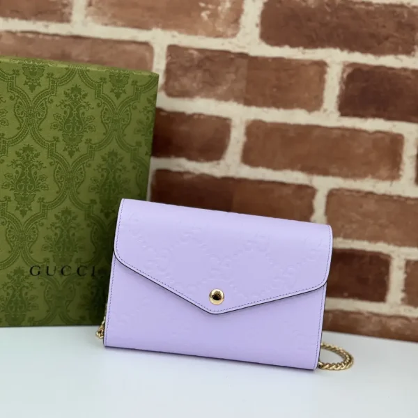 Gucci Embossed GG Chain Crossbody Bag image 1