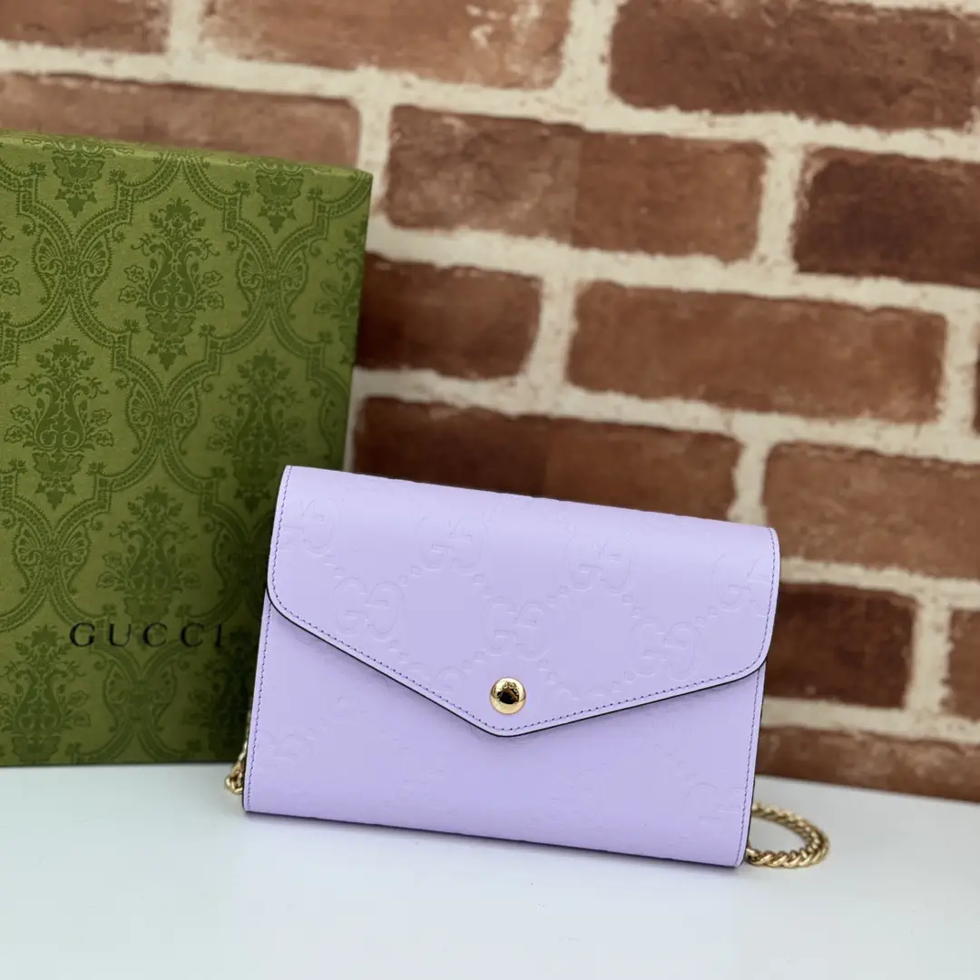 Gucci Embossed GG Chain Crossbody Bag image 1