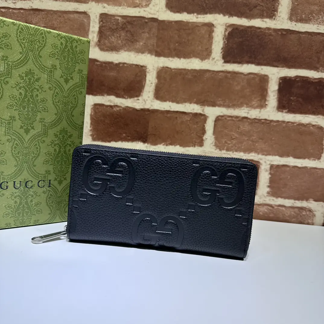 Gucci Black Embossed GG Zip Around Wallet image 1