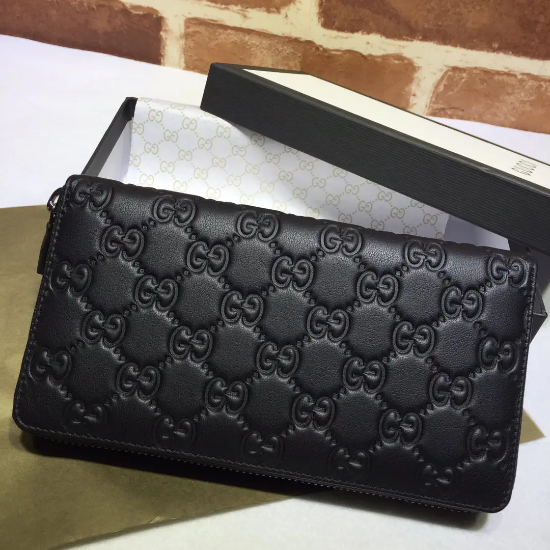 Gucci Black Embossed GG Zip Around Wallet image 1