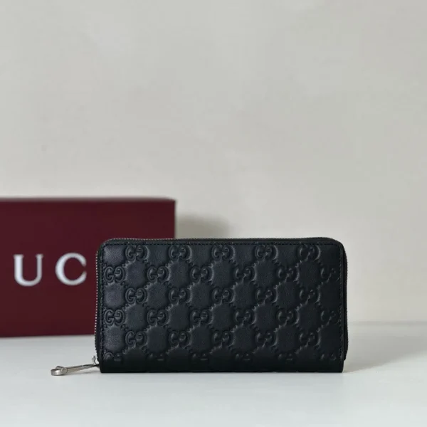 Gucci Black Embossed Monogram Zip Around Wallet image 1
