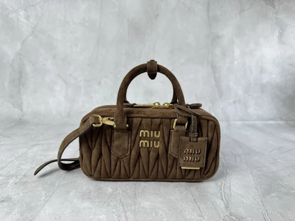 Miu Miu Quilted Suede Top Handle Bag image 1