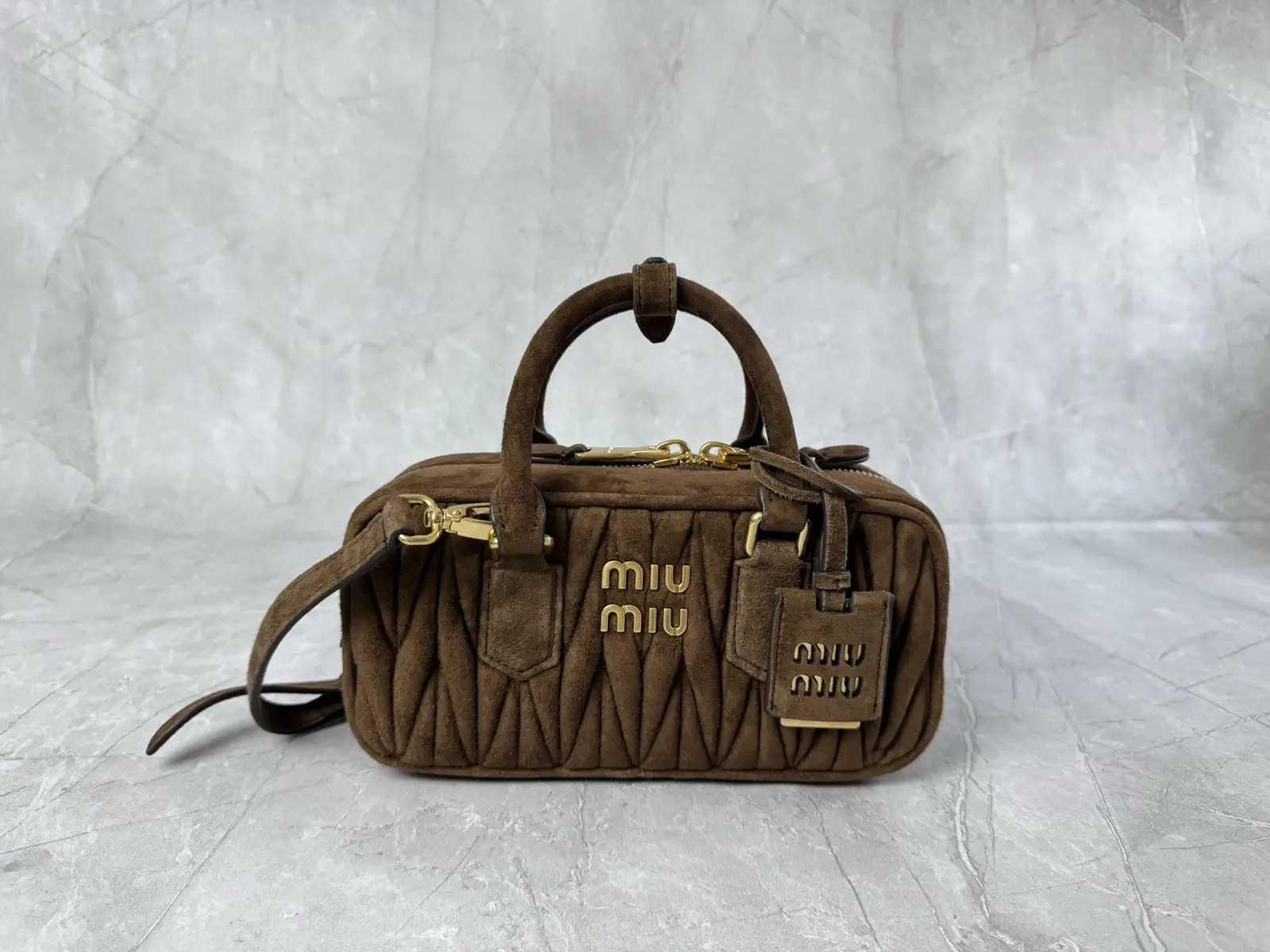 Miu Miu Quilted Suede Top Handle Bag image 1