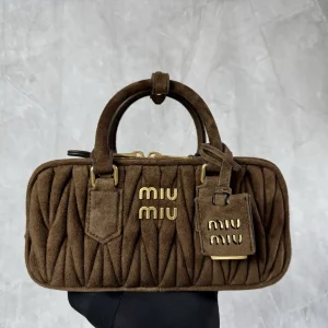 Miu Miu Quilted Suede Top Handle Bag image 1