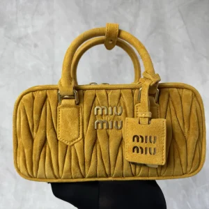 Miu Miu Yellow Quilted Suede Top Handle Bag image 1