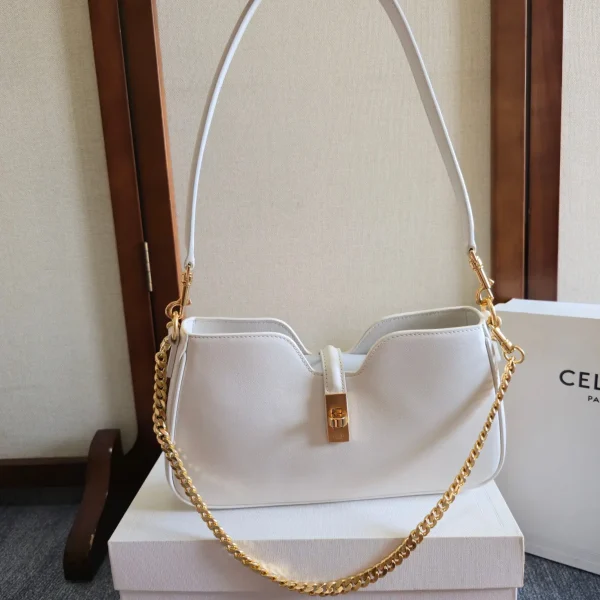 CELINE White Shoulder Bag with Gold Lock Closure image 1