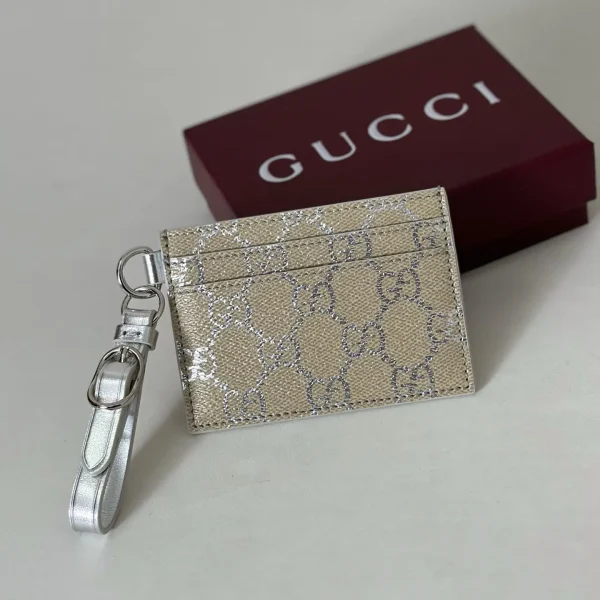 Gucci Monogram Card Holder with Wrist Strap image 1