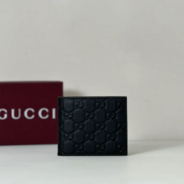 Gucci Black Embossed Monogram Wallet image 1