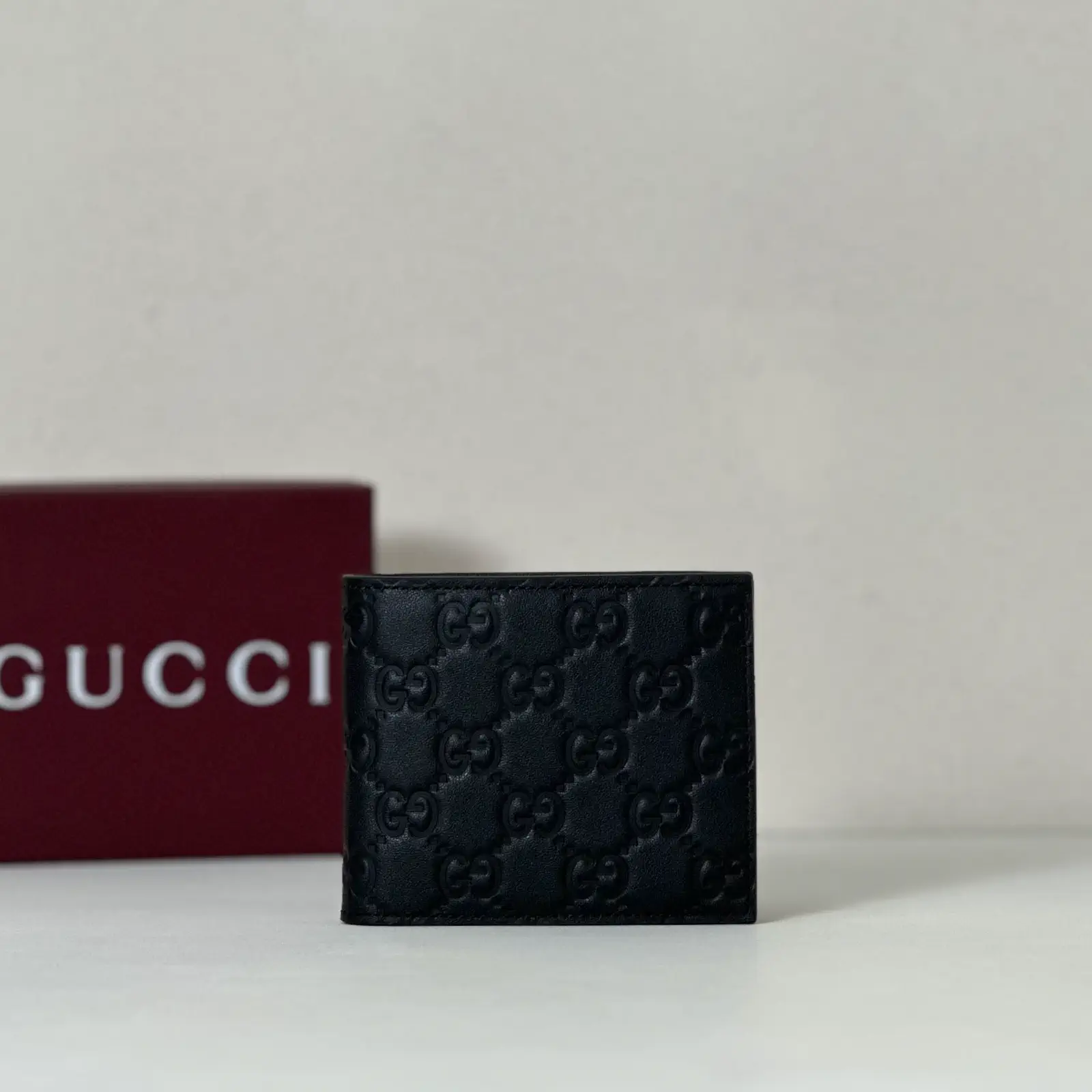 Gucci Black Embossed Monogram Wallet image 1
