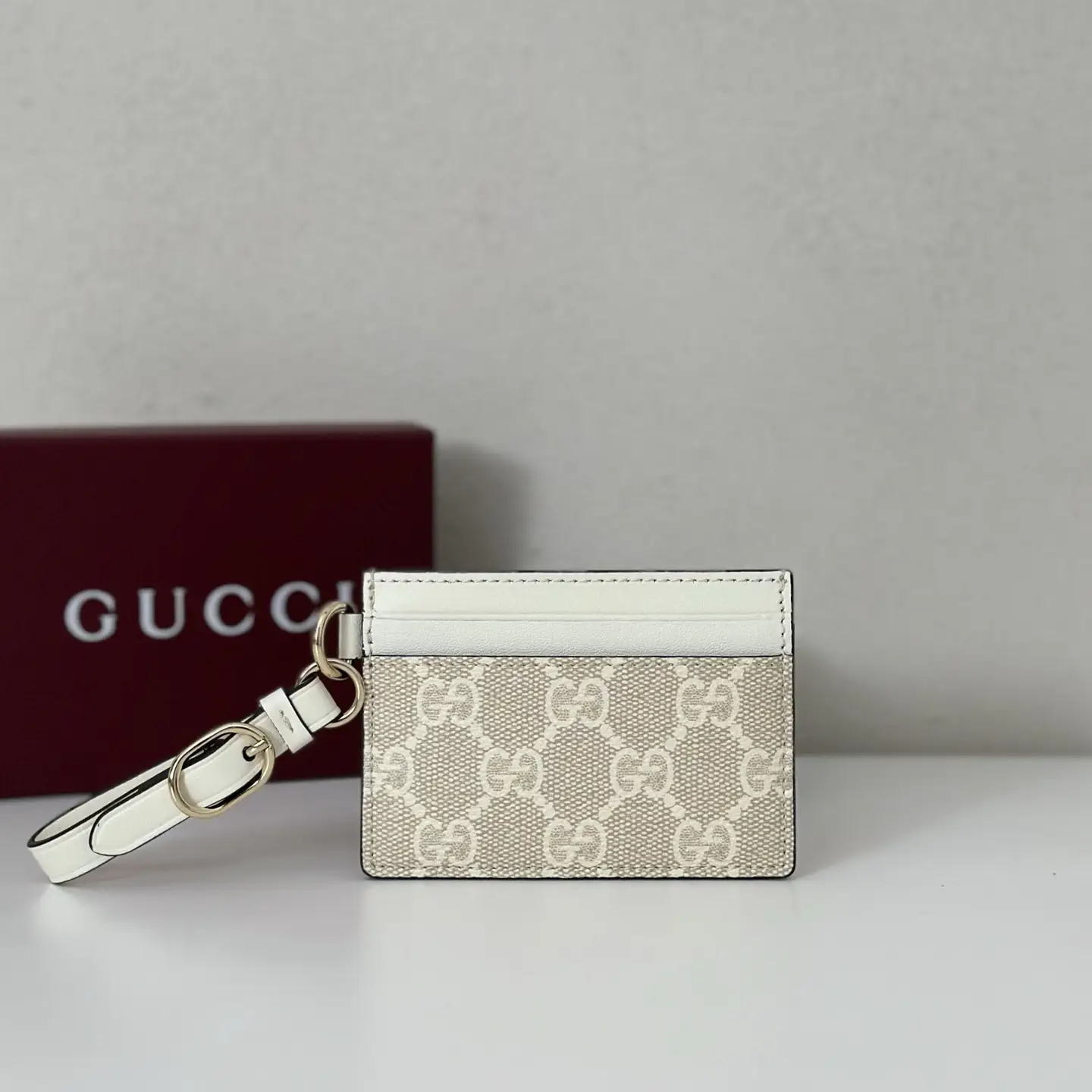 Gucci Monogram Card Holder with Wrist Strap image 1