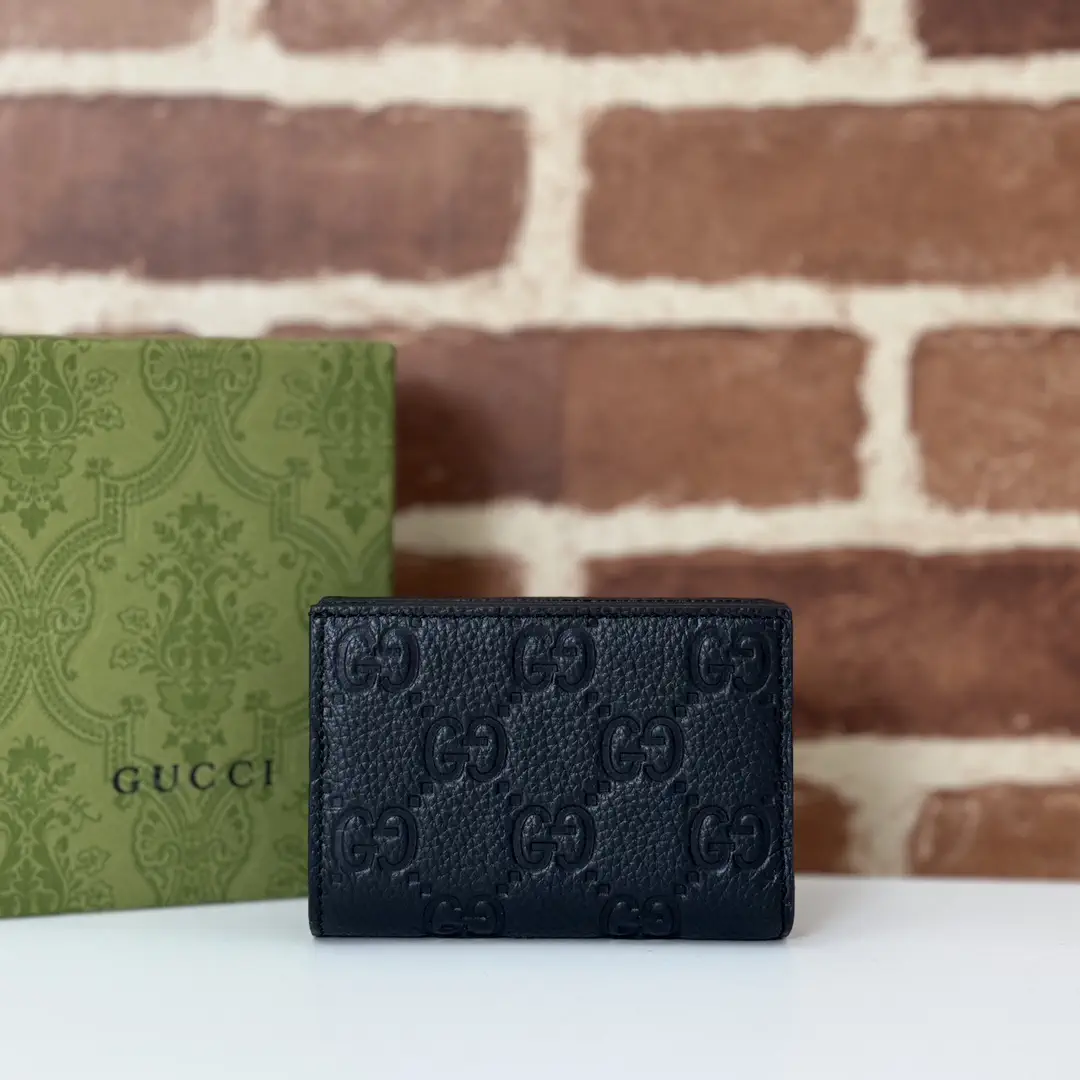 Gucci Black Embossed GG Wallet image 1