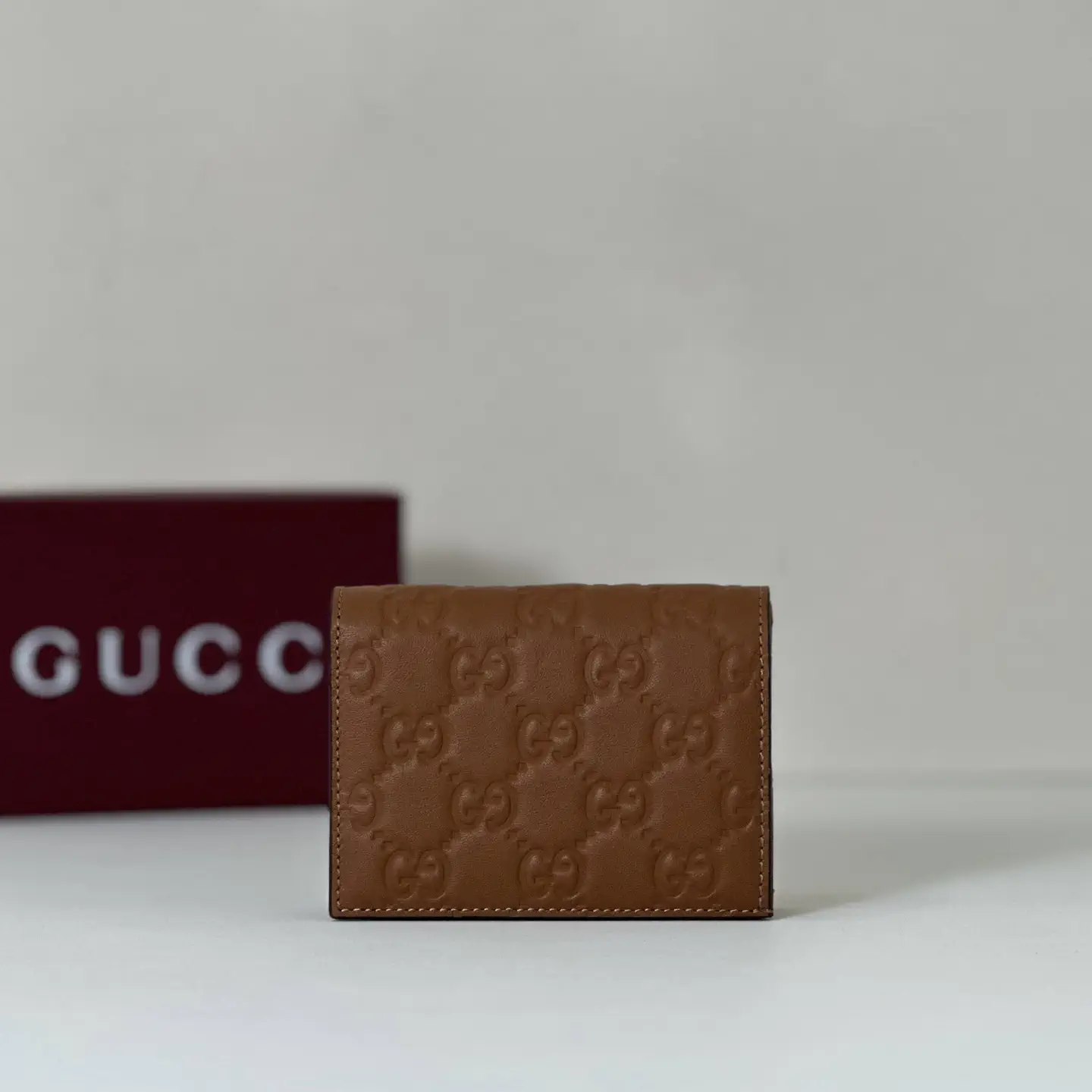 Gucci Brown Embossed Monogram Wallet image 1