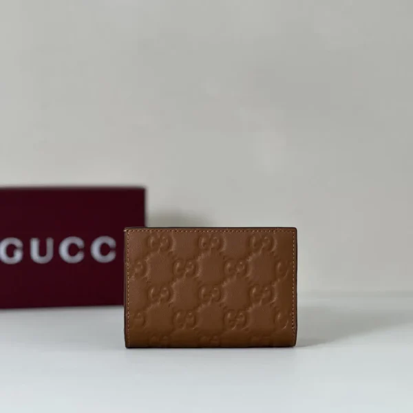 Gucci Brown Embossed Monogram Wallet image 1