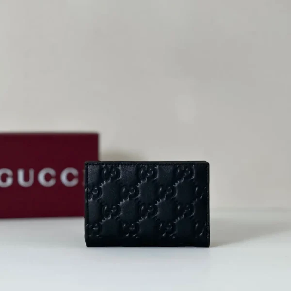 Gucci Black Embossed Monogram Wallet image 1