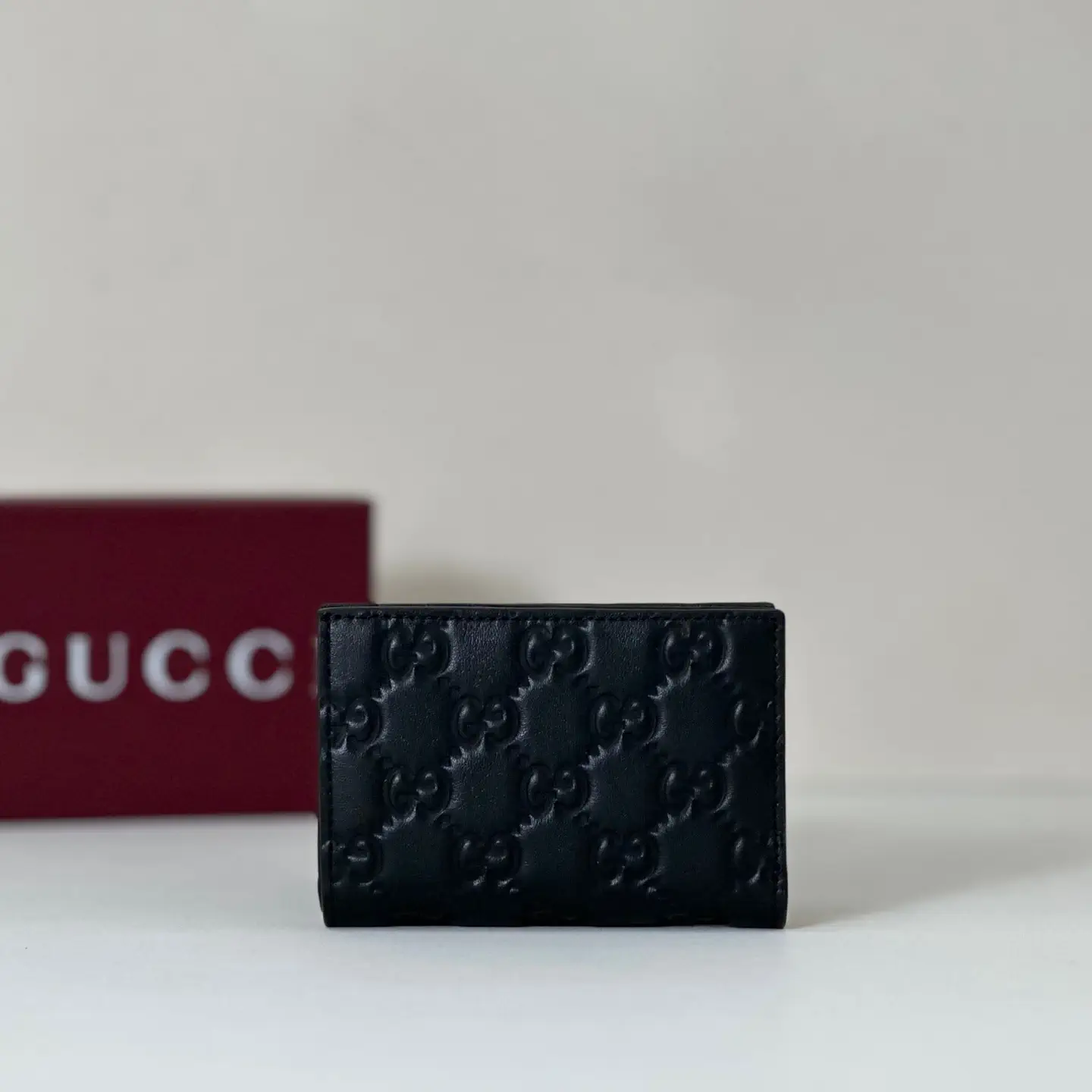 Gucci Black Embossed Monogram Wallet image 1