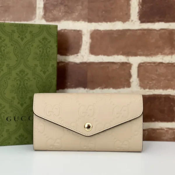Gucci Beige Embossed Long Wallet image 1