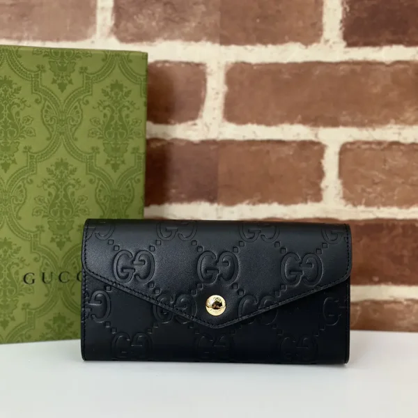 Gucci Black Embossed GG Wallet image 1