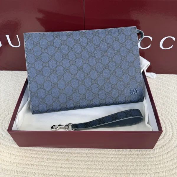 Gucci Monogram Clutch image 1