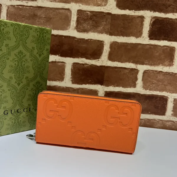Gucci Orange Embossed GG Zip Around Wallet image 1