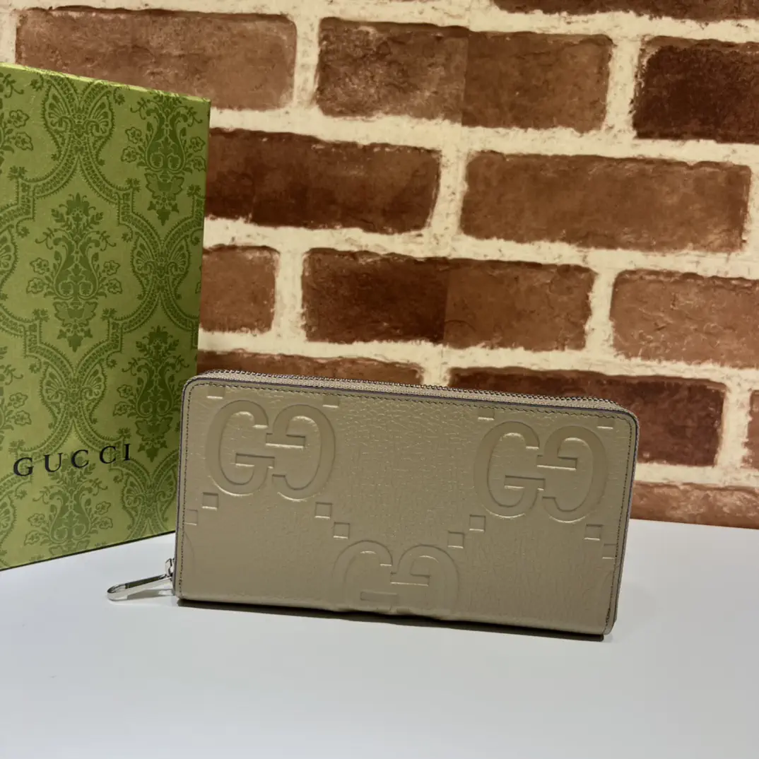 Gucci Embossed GG Zip Around Wallet image 1
