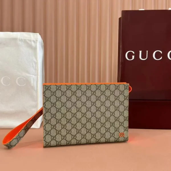 Gucci Monogram Clutch with Orange Trim image 1