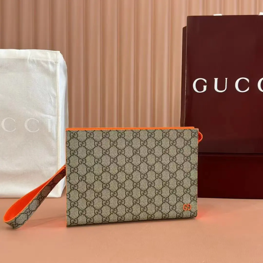 Gucci Monogram Clutch with Orange Trim image 1