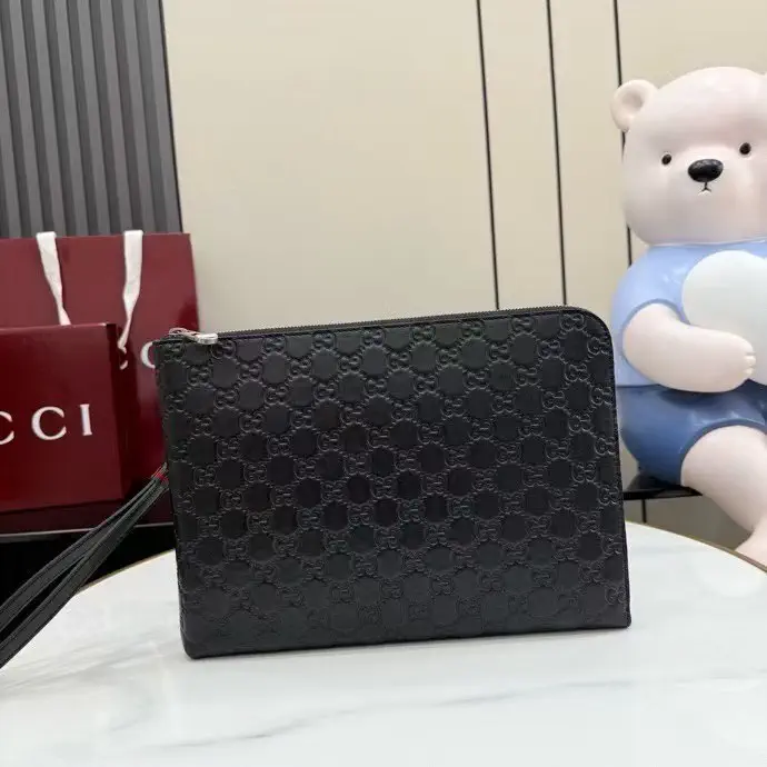 Gucci GG Embossed Clutch image 1