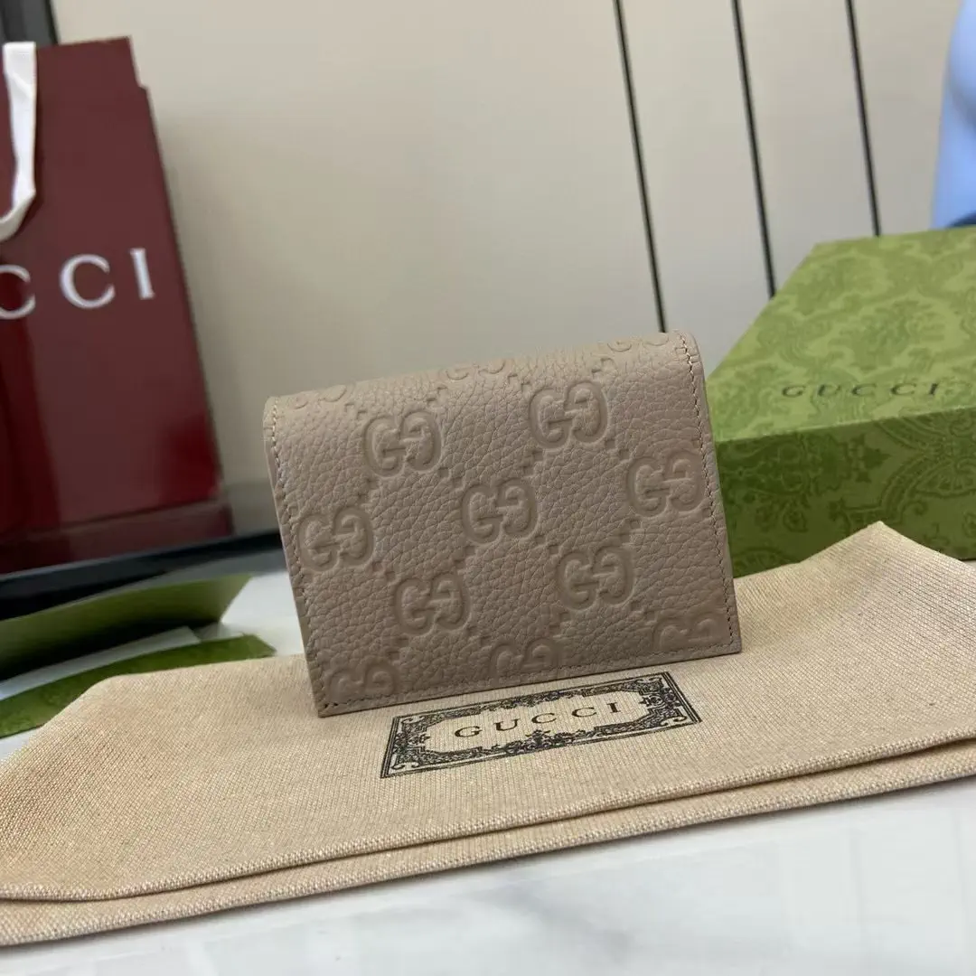 Gucci GG Emblem Embossed Leather Wallet image 1