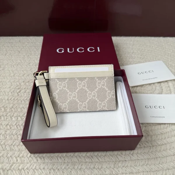 Gucci Monogram Card Holder with Wrist Strap image 1