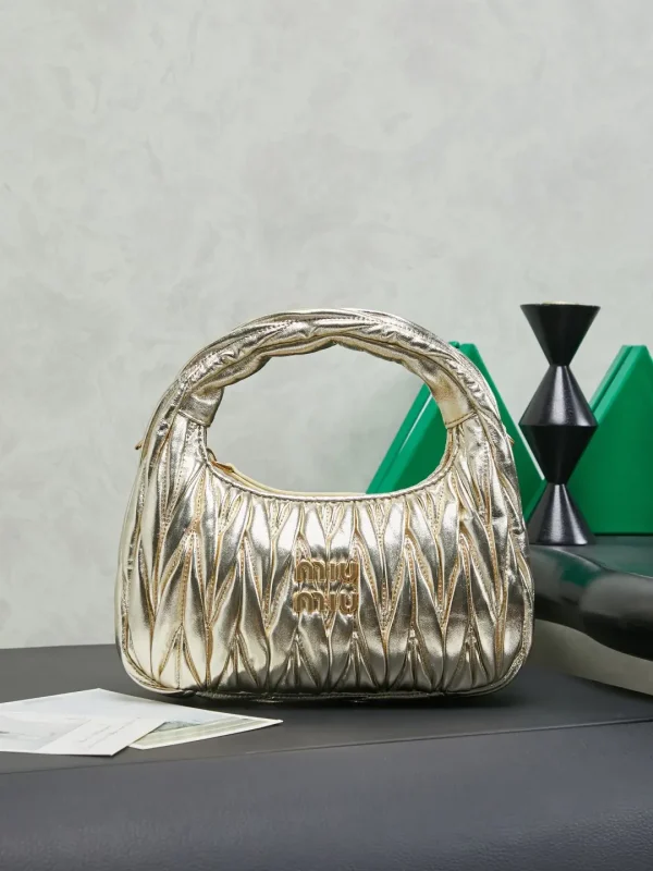 Miu Miu Quilted Metallic Top Handle Bag image 1