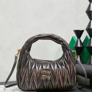 Miu Miu Quilted Top Handle Bag with Detachable Strap image 1