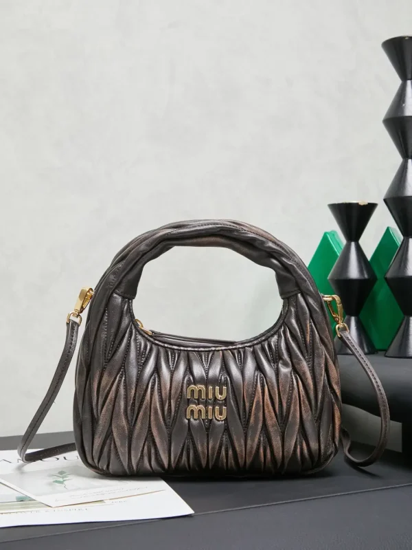 Miu Miu Quilted Top Handle Bag with Detachable Strap image 1
