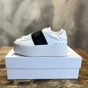 White Platform Sneakers with Black Studded Strap image 1