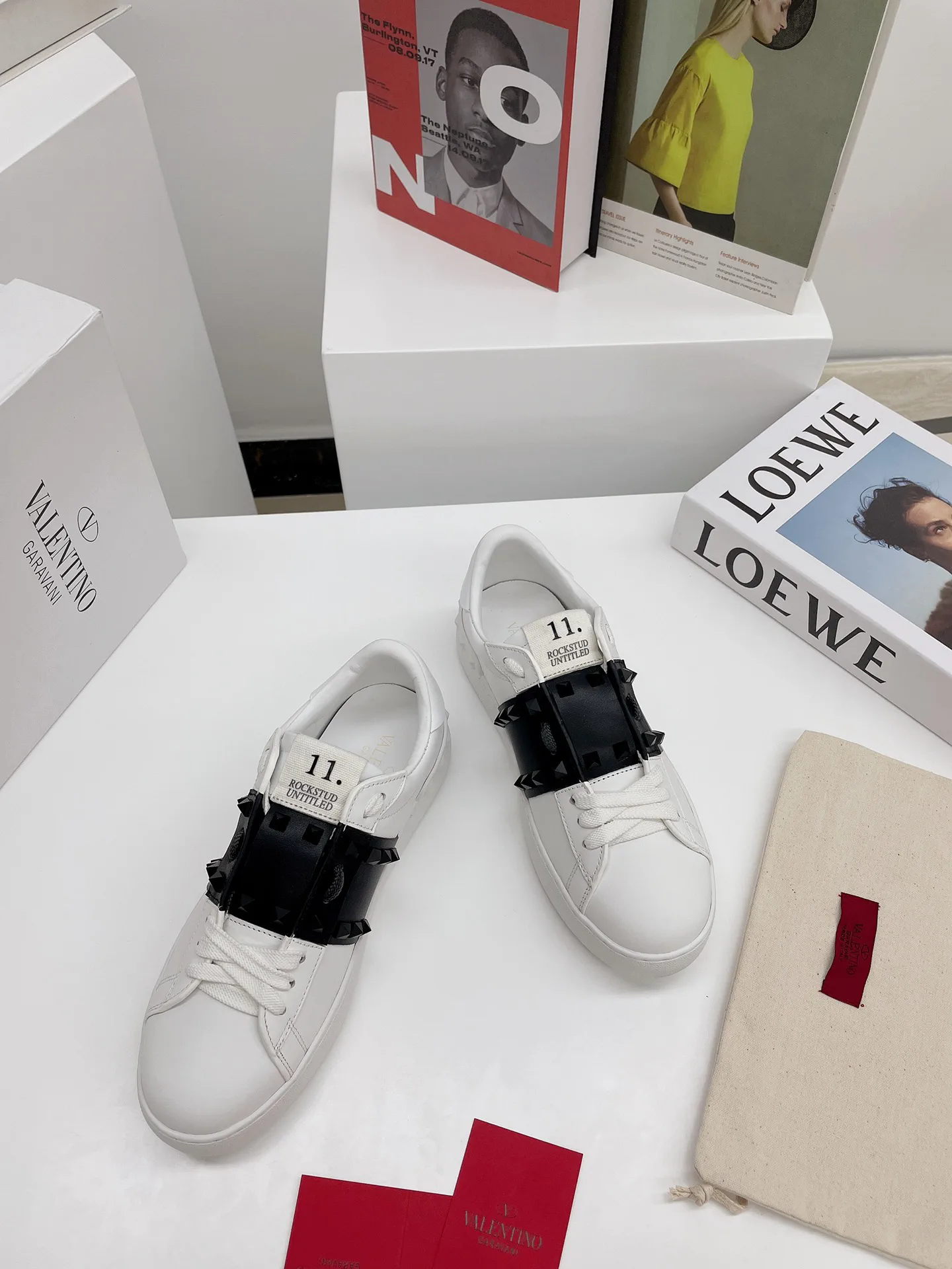 White Low-Top Sneakers with Black Studded Strap image 1