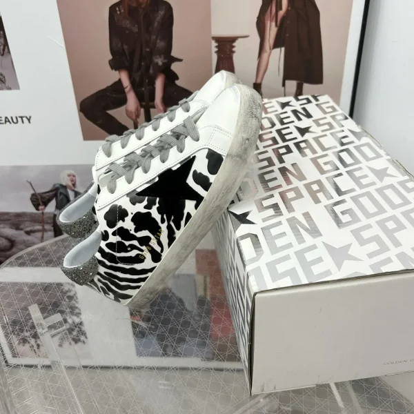 Women's Super Star Cow Print Distressed Sneakers image 1