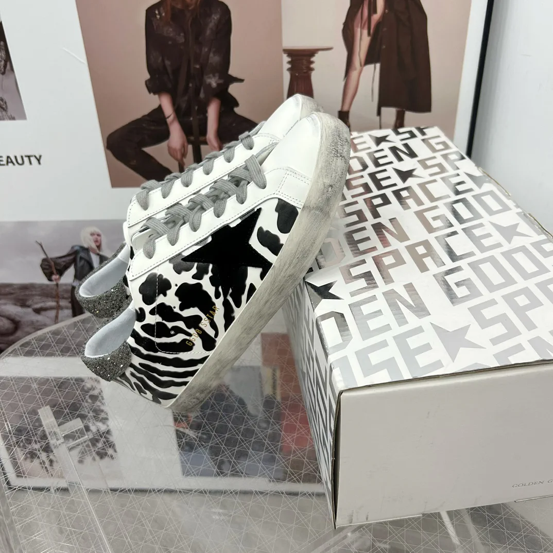Women's Super Star Cow Print Distressed Sneakers image 1