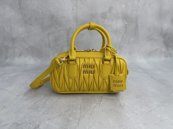 Miu Miu Yellow Quilted Top Handle Bag image 1