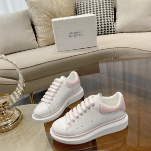 White Platform Sneakers with Pink Accents image 1