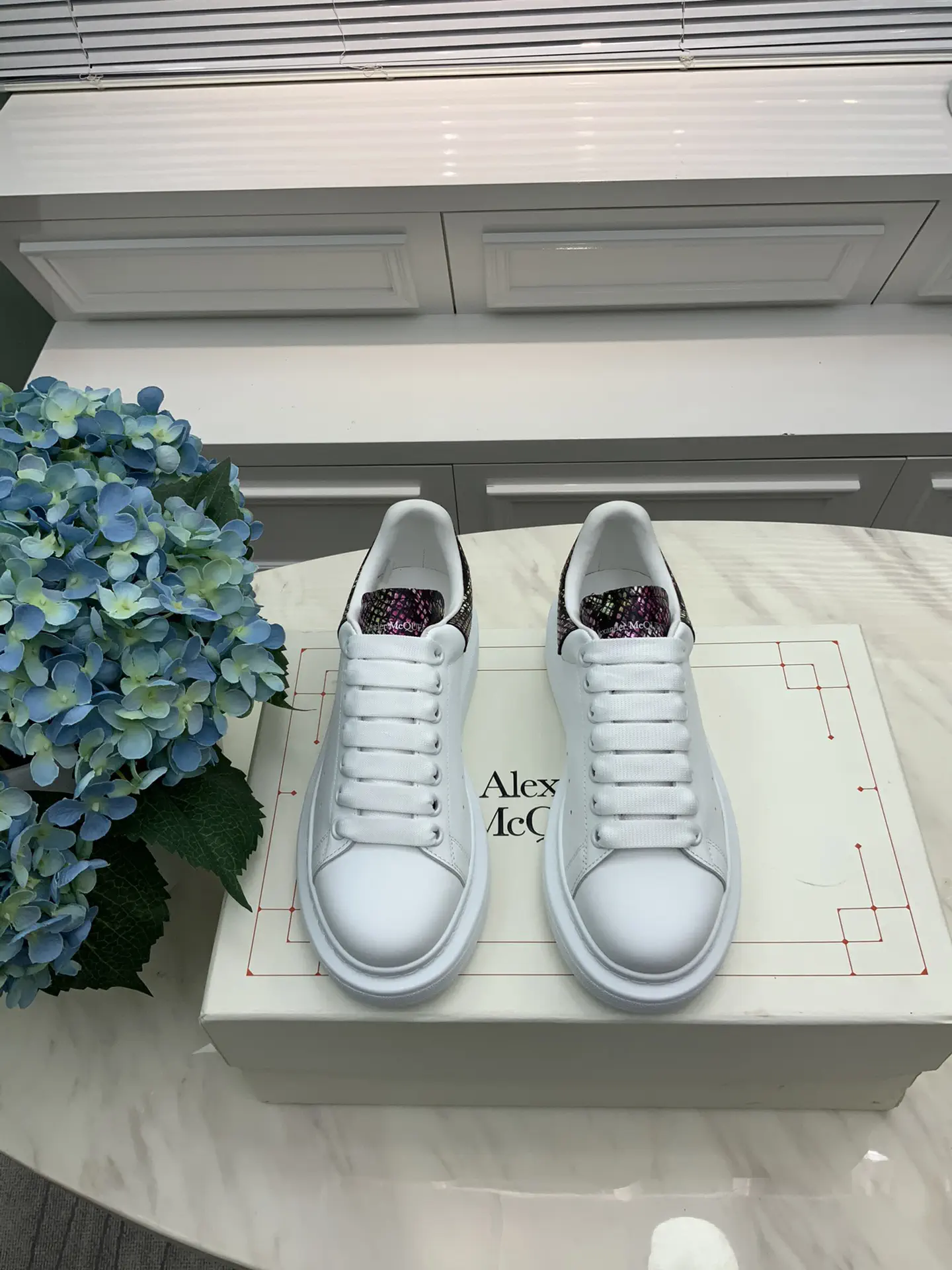 White Sneakers with Snake Print Heel Tabs image 1