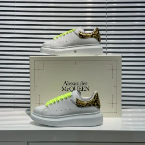 White Platform Sneakers with Snake Print Heel Tab and Neon Laces image 1