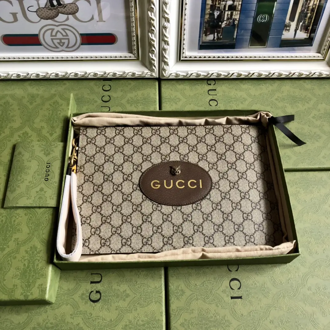 Gucci Monogram Tiger Head Clutch image 1